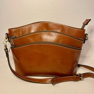 Gorgeous cognac brown leather handbag by Patricia Nash